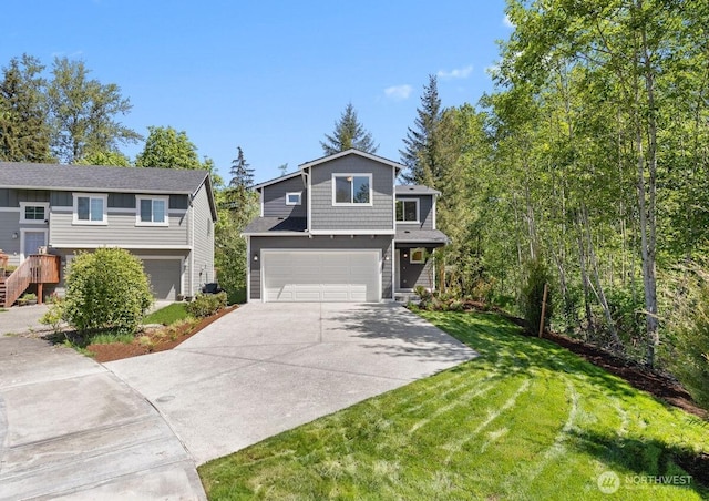 32559 141st St SE, Sultan, WA 98294 - view of front of house with an attached garage, driveway, and a front yard