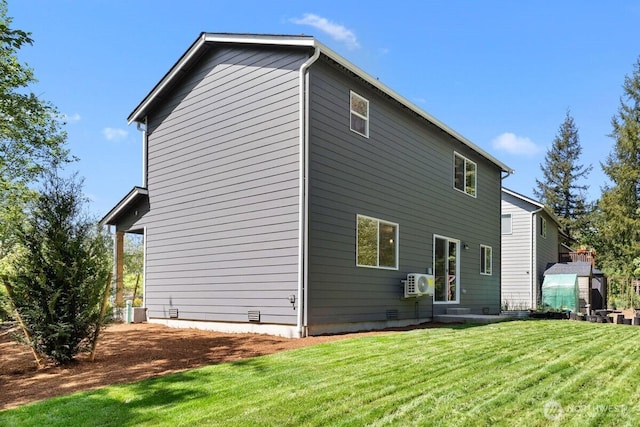 32559 141st St SE, Sultan, WA 98294 - back of property with a yard, a cooling unit, and crawl space