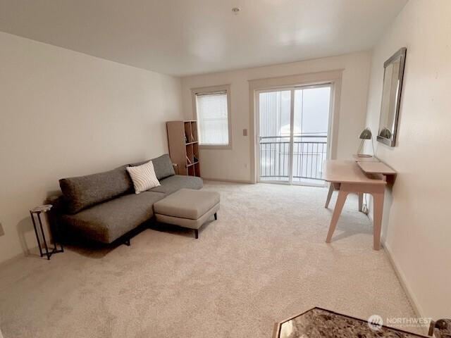 326 Queen Anne Ave N Unit 502, Seattle, WA 98109 - living room with light carpet