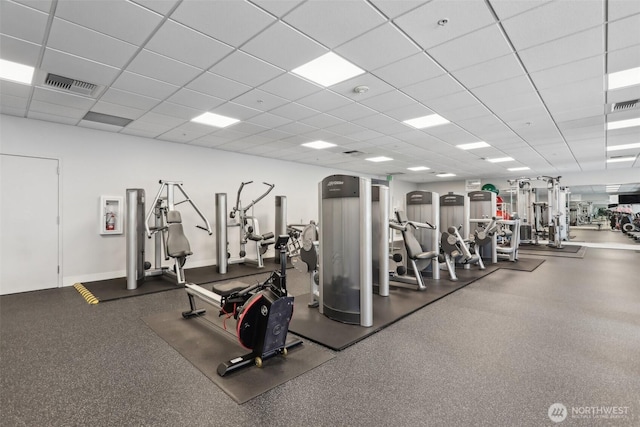 workout area featuring visible vents and a drop ceiling