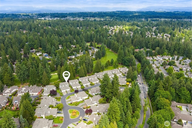 2003 Mill Pointe Dr SE, Mill Creek, WA 98012 - aerial view of residential area with a heavily wooded area