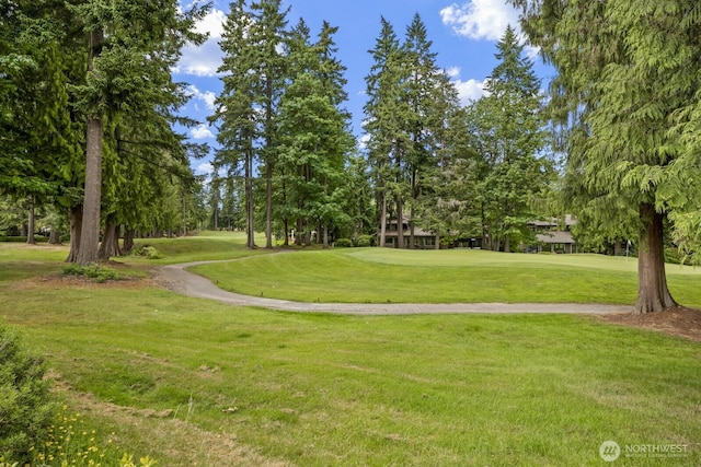 2003 Mill Pointe Dr SE, Mill Creek, WA 98012 - view of property's community with a lawn, view of wooded area, and view of golf course