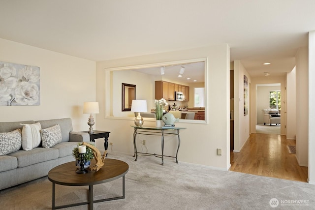 2003 Mill Pointe Dr SE, Mill Creek, WA 98012 - living room with light colored carpet, baseboards, and recessed lighting