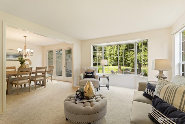 2003 Mill Pointe Dr SE, Mill Creek, WA 98012 - living area featuring a chandelier and carpet flooring