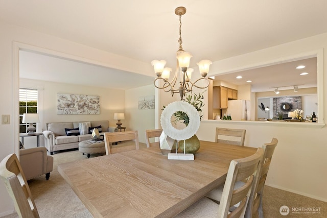 2003 Mill Pointe Dr SE, Mill Creek, WA 98012 - dining room featuring light colored carpet, a chandelier, recessed lighting, and baseboards