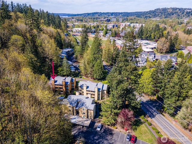 bird's eye view featuring a view of trees