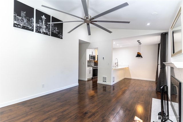 unfurnished living room with recessed lighting, dark wood-style floors, visible vents, a ceiling fan, and lofted ceiling