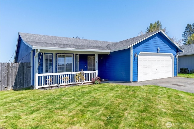 ranch-style house with an attached garage, covered porch, a front lawn, and aphalt driveway