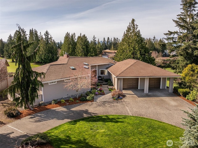 6250 Woodcock Rd, Sequim, WA 98382 - view of front of property featuring a garage, a front lawn, and concrete driveway