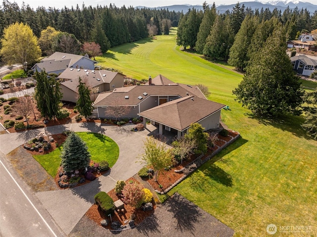 6250 Woodcock Rd, Sequim, WA 98382 - aerial perspective of suburban area with a mountain backdrop and a forest