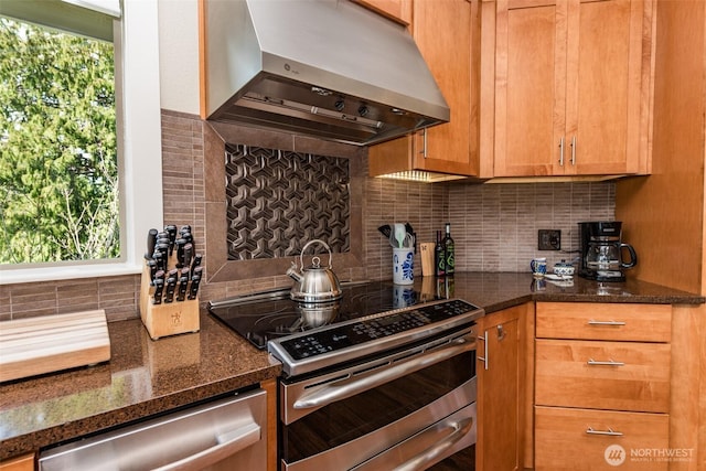 6250 Woodcock Rd, Sequim, WA 98382 - kitchen with stainless steel appliances, range hood, healthy amount of natural light, and backsplash
