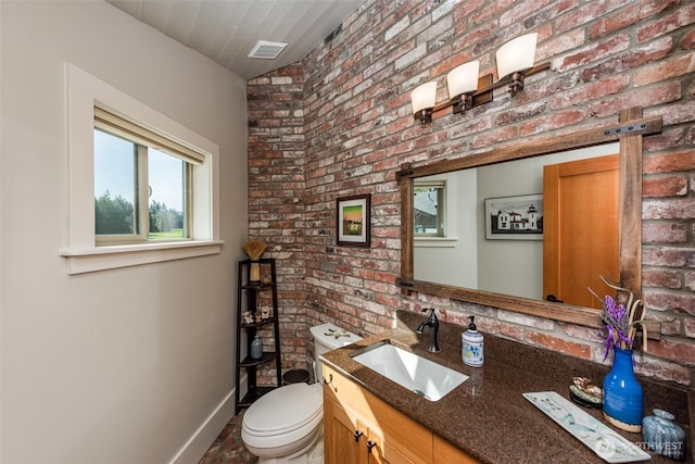6250 Woodcock Rd, Sequim, WA 98382 - half bath with vanity and brick wall