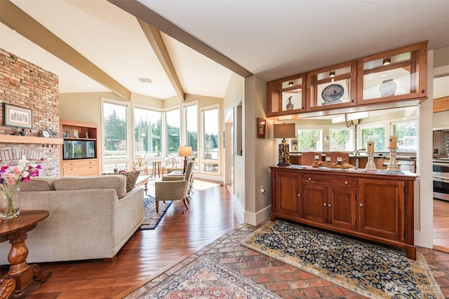 6250 Woodcock Rd, Sequim, WA 98382 - living room featuring baseboards and wood finished floors