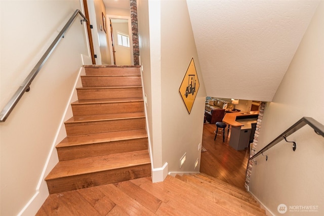 6250 Woodcock Rd, Sequim, WA 98382 - stairs with hardwood / wood-style floors and baseboards