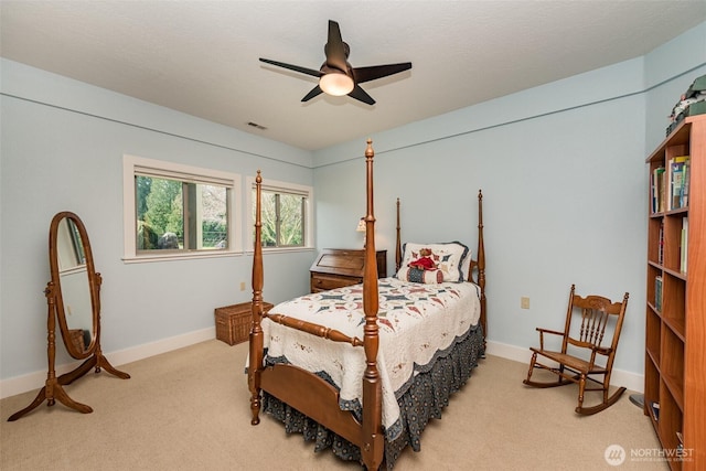 6250 Woodcock Rd, Sequim, WA 98382 - bedroom with light colored carpet and ceiling fan