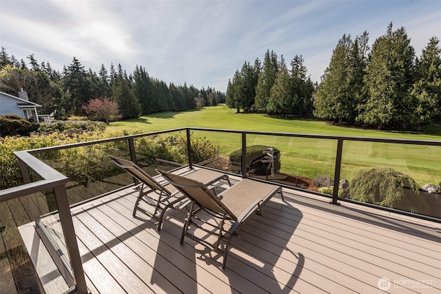 6250 Woodcock Rd, Sequim, WA 98382 - wooden deck featuring a yard and view of wooded area
