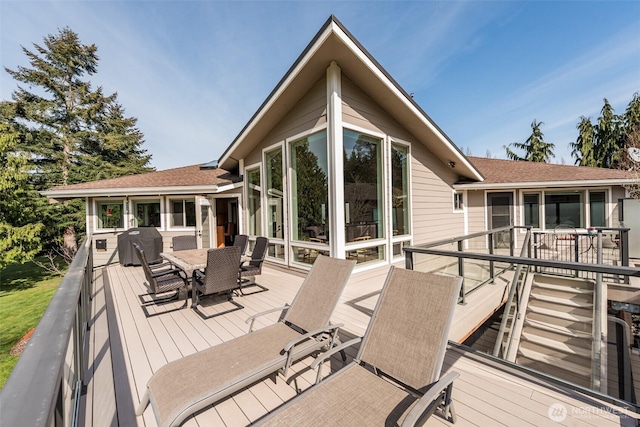 6250 Woodcock Rd, Sequim, WA 98382 - wooden deck with outdoor dining space and grilling area