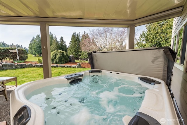 6250 Woodcock Rd, Sequim, WA 98382 - sunroom / solarium with a jacuzzi and view of wooded area
