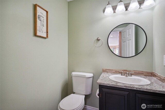 24214 38th Avenue Ct E, Spanaway, WA 98387 - bathroom featuring toilet and vanity