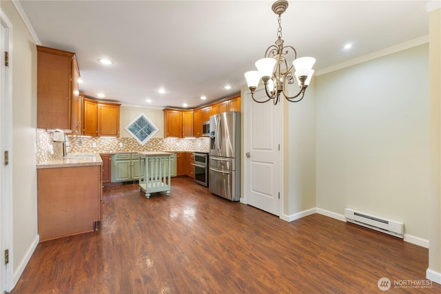 kitchen featuring stainless steel appliances, dark wood-style floors, baseboard heating, and tasteful backsplash