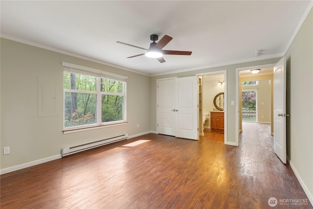unfurnished bedroom featuring crown molding, multiple windows, and a baseboard radiator