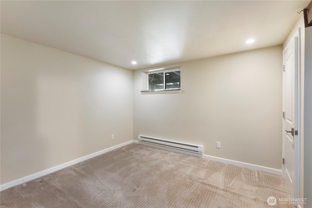 carpeted empty room featuring recessed lighting, baseboards, and a baseboard heating unit