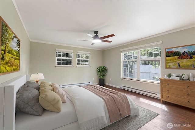 bedroom featuring ceiling fan, a baseboard heating unit, ornamental molding, and wood finished floors