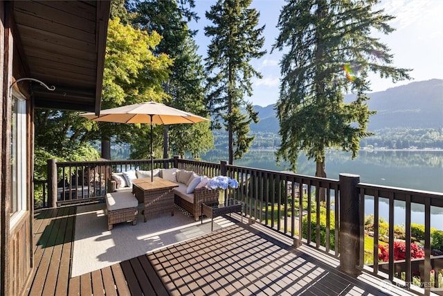 486 W Lake Samish Dr, Bellingham, WA 98229 - wooden terrace with an outdoor living space and a water and mountain view
