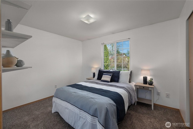 carpeted bedroom with baseboards