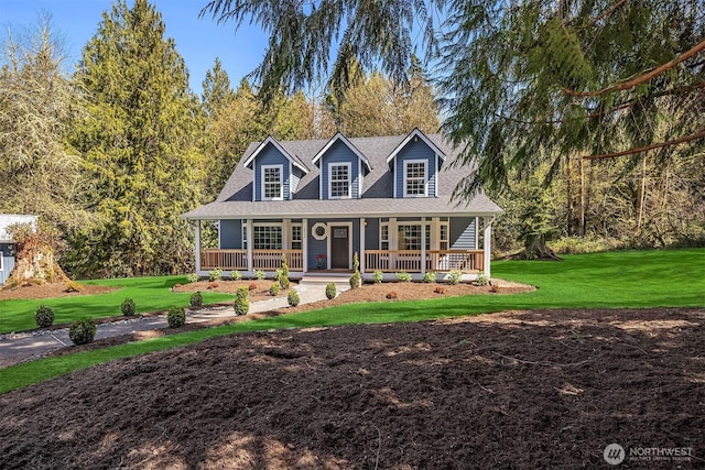 cape cod home featuring a porch, a shingled roof, and a front lawn