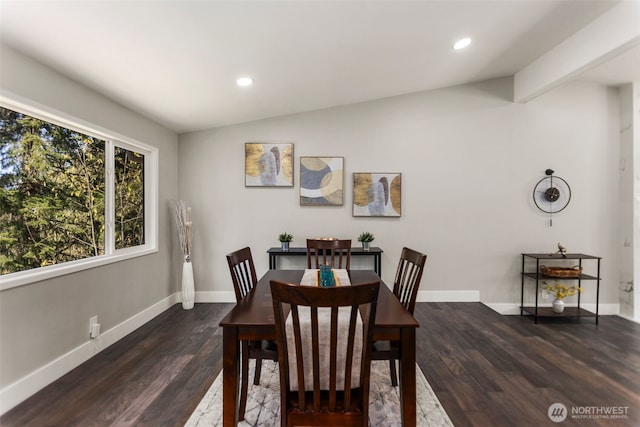 dining room featuring recessed lighting, lofted ceiling, dark wood-style floors, and baseboards