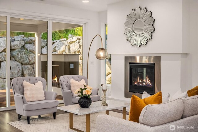 16515 26th St E, Lake Tapps, WA 98391 - living room with a glass covered fireplace, wood finished floors, and recessed lighting