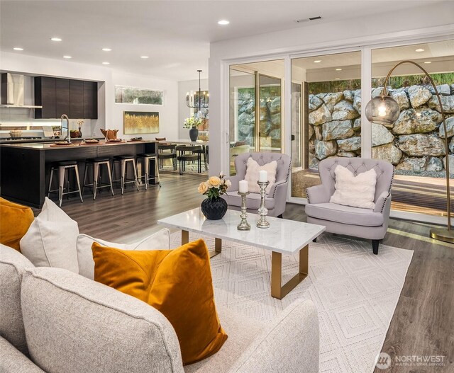 16515 26th St E, Lake Tapps, WA 98391 - living area with light wood-type flooring, recessed lighting, and a chandelier