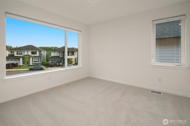 16515 26th St E, Lake Tapps, WA 98391 - spare room featuring carpet floors and baseboards