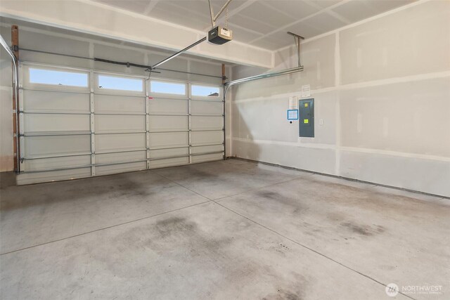 16515 26th St E, Lake Tapps, WA 98391 - garage with a garage door opener and electric panel