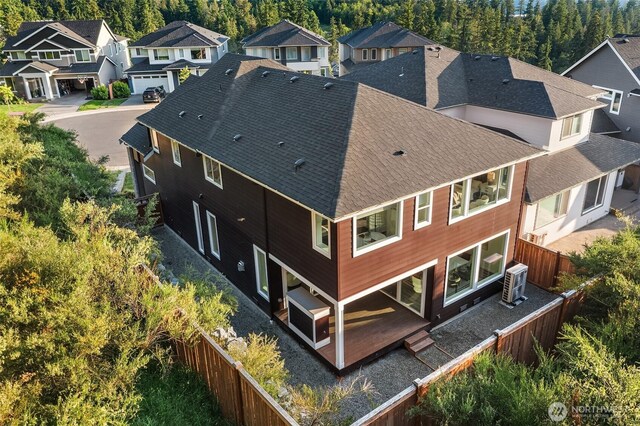 16515 26th St E, Lake Tapps, WA 98391 - aerial perspective of suburban area with a forest