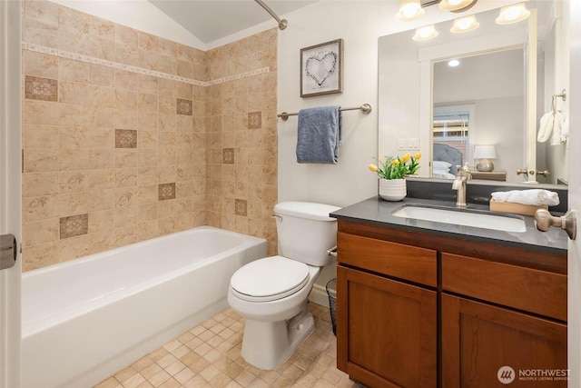 5235 11th Ave NE Unit A, Seattle, WA 98105 - full bath with toilet, vanity, bathtub / shower combination, and vaulted ceiling