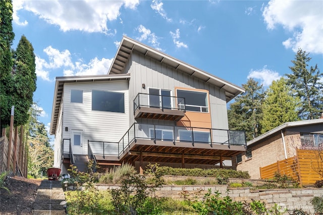 9028 45th Ave NE, Seattle, WA 98115 - back of house featuring board and batten siding and a balcony