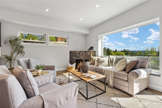 9028 45th Ave NE, Seattle, WA 98115 - living room with wood finished floors, a wealth of natural light, and recessed lighting