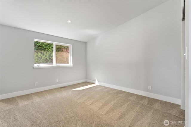 9028 45th Ave NE, Seattle, WA 98115 - carpeted spare room with baseboards, visible vents, and recessed lighting