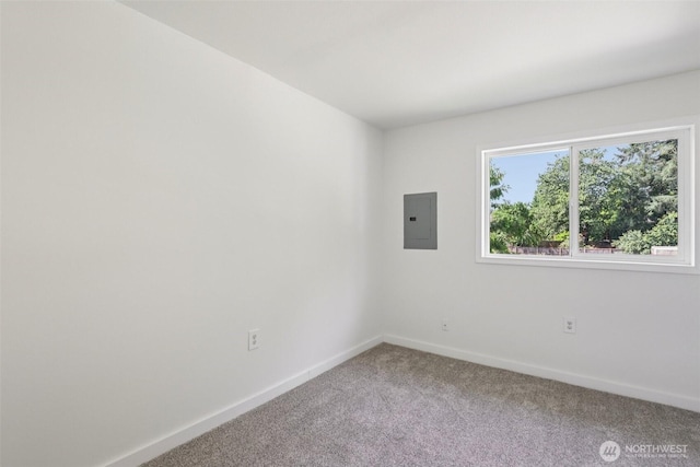 3718 NE Everett St, Camas, WA 98607 - unfurnished room featuring electric panel, carpet floors, and baseboards