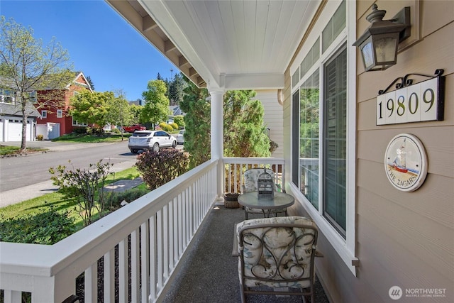 balcony featuring a porch