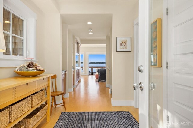 10915NE S Beach Rd, Bainbridge Island, WA 98110 - hall with light wood-style flooring, baseboards, and recessed lighting
