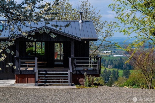 exterior space with a standing seam roof and metal roof