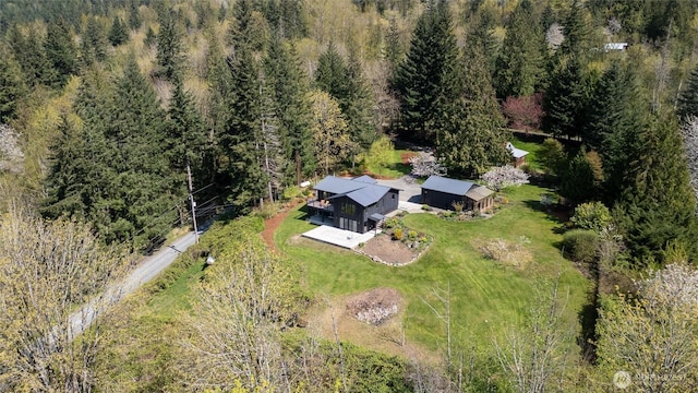 aerial view featuring a view of trees