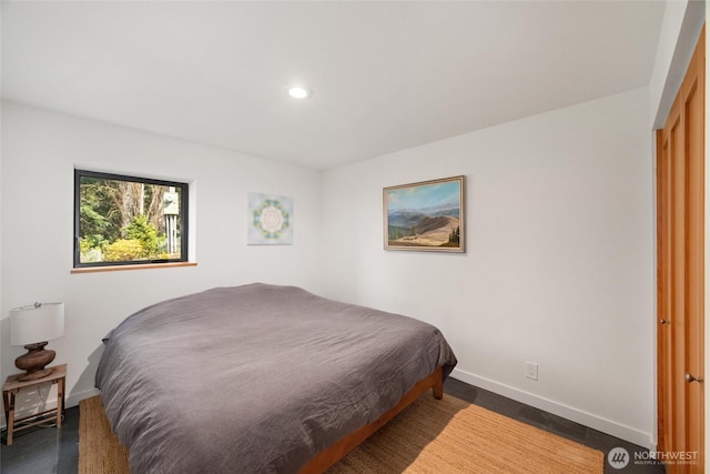 bedroom with baseboards and recessed lighting