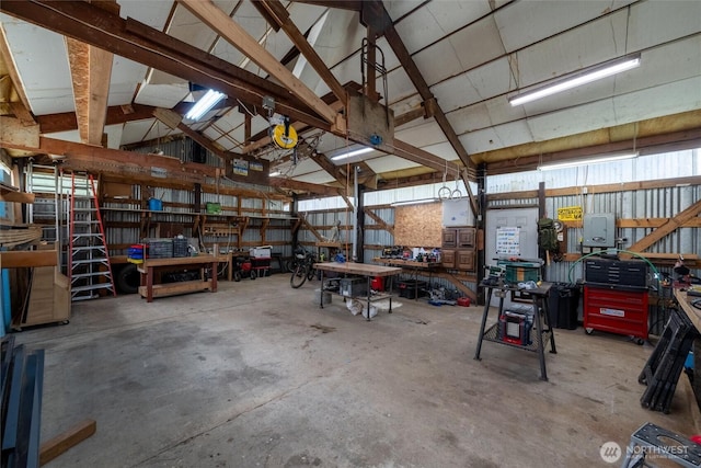 garage with a workshop area