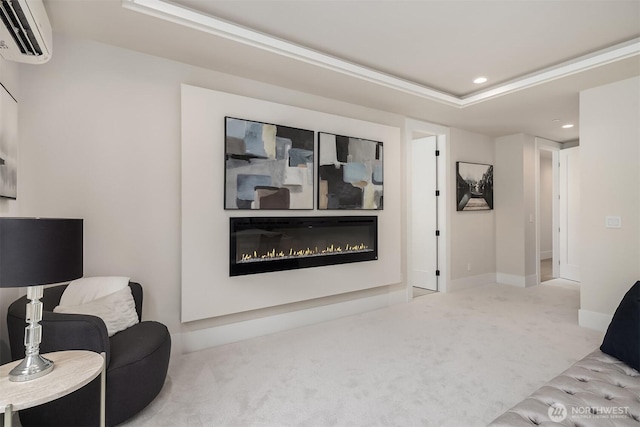 11896 SE 5th St, Bellevue, WA 98805 - living area featuring a glass covered fireplace, an AC wall unit, recessed lighting, a raised ceiling, and carpet flooring
