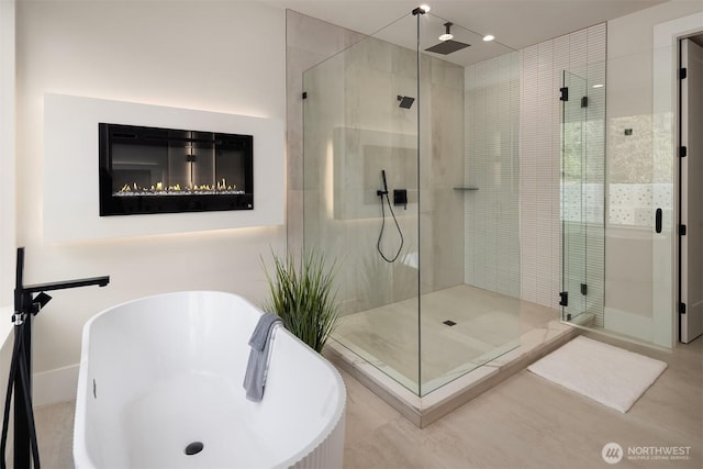 11896 SE 5th St, Bellevue, WA 98805 - bathroom featuring a shower stall and a soaking tub