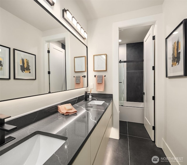 11896 SE 5th St, Bellevue, WA 98805 - full bath with double vanity, enclosed tub / shower combo, a sink, and tile patterned flooring